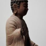 Why People Are Returning to Spirituality in a Hyperconnected World Person practicing quiet mindfulness in a natural setting
